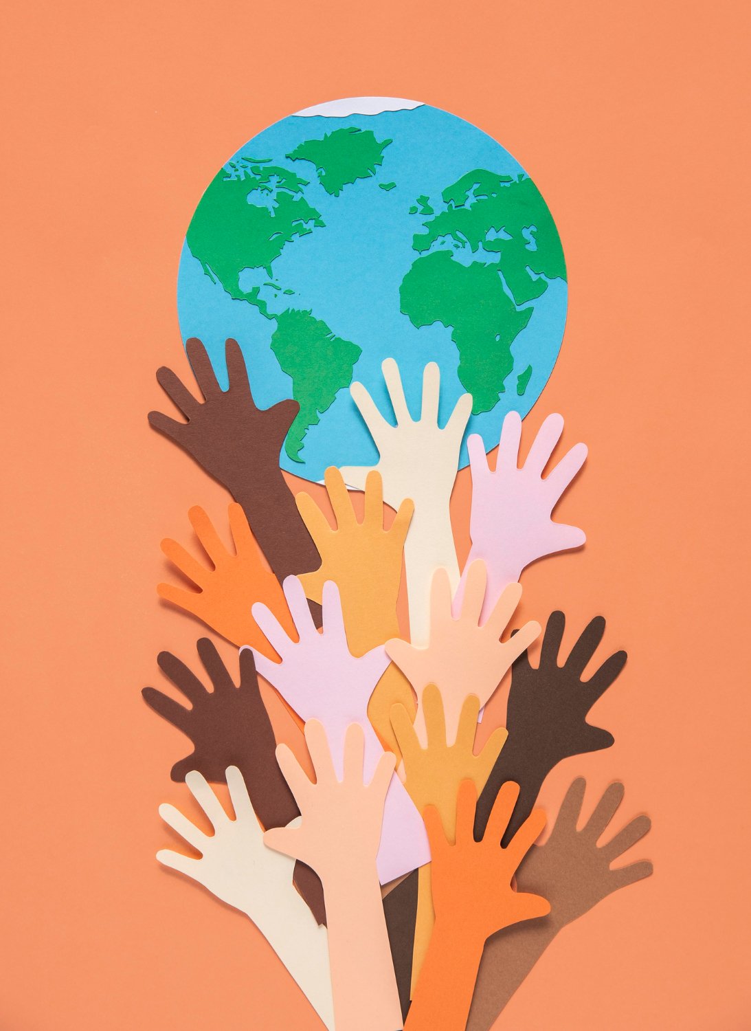 Hands holding a globe, symbolizing global reach and translation by Verbshine.